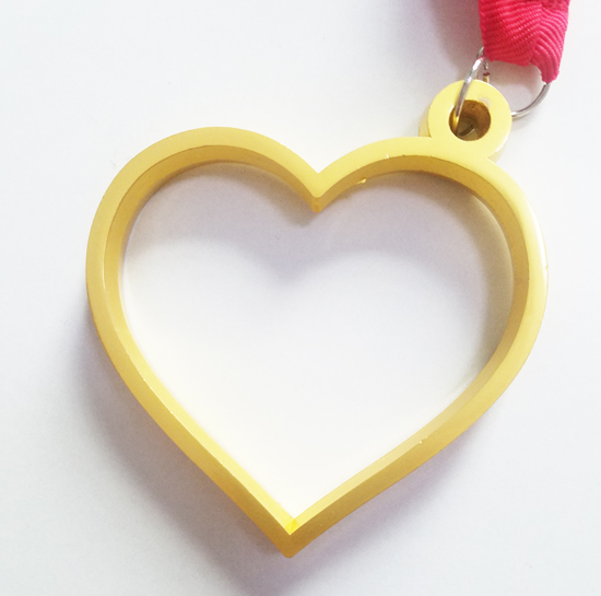 gold heart-shaped medal