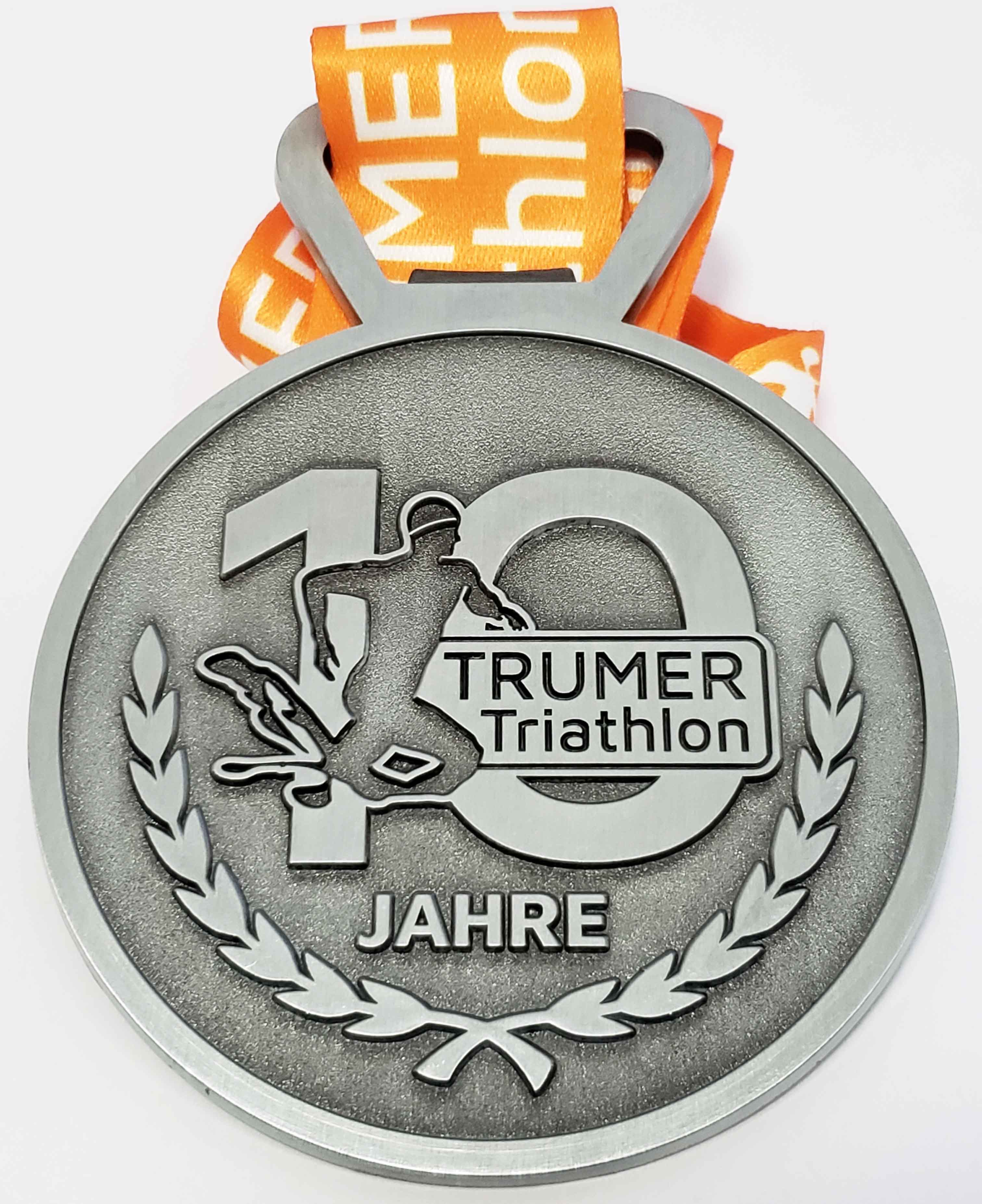 Trumer triathlon medal with antique tin