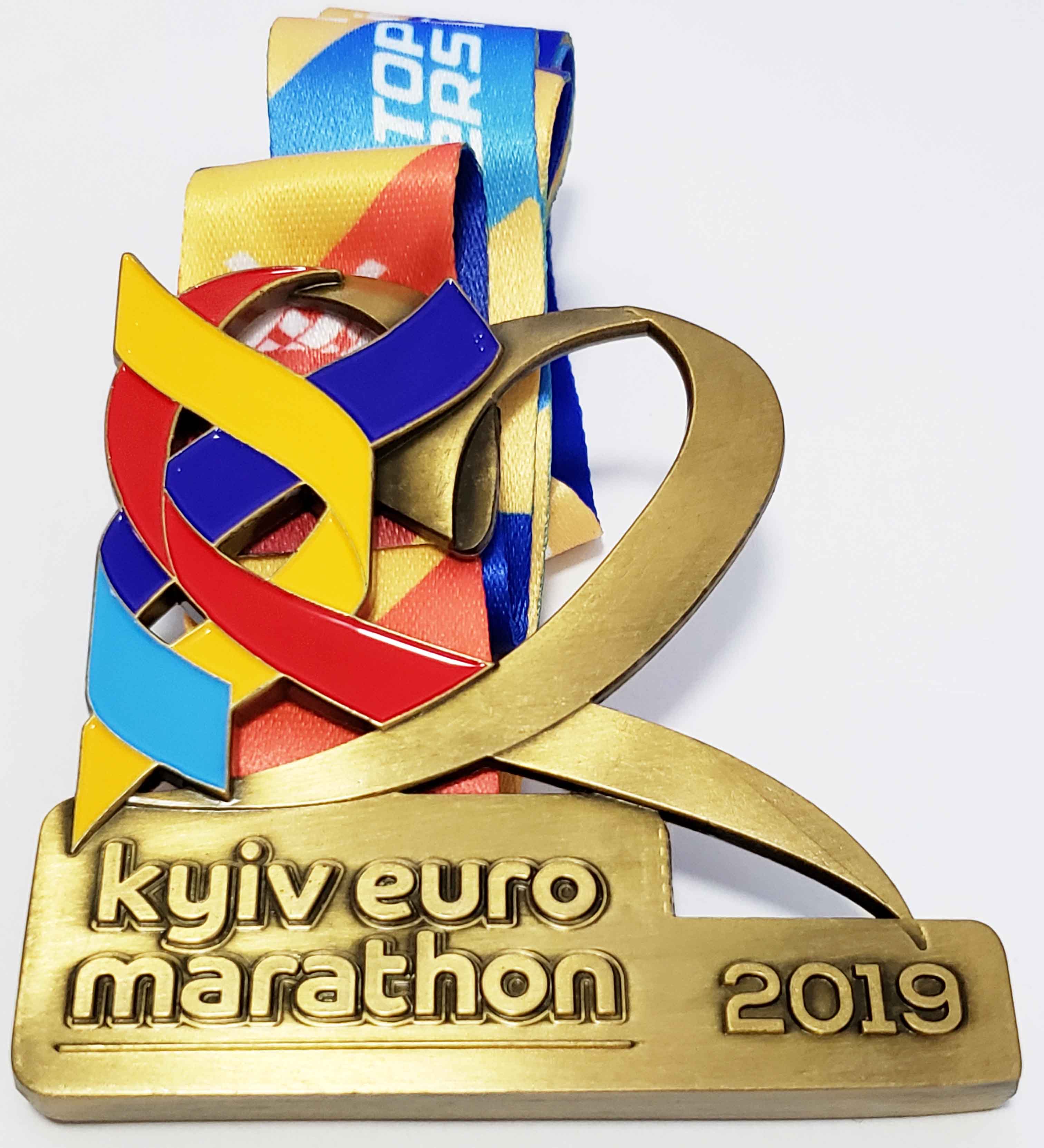 marathon medal with antique gold