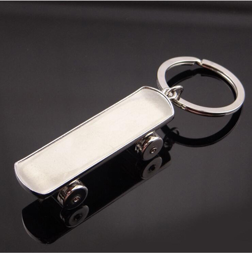 silver metal keychain-scooter keychain